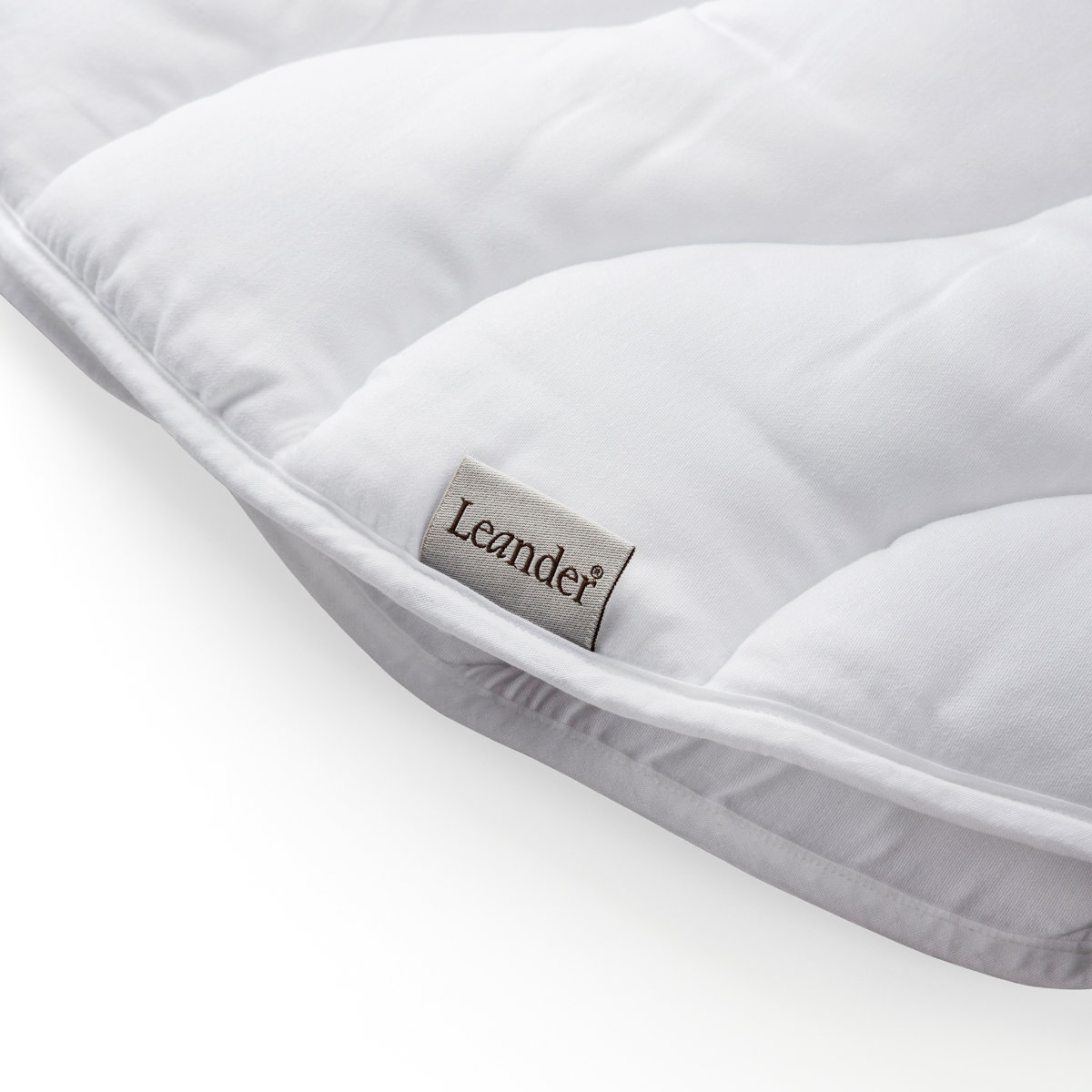 Leander topmatras babybedje